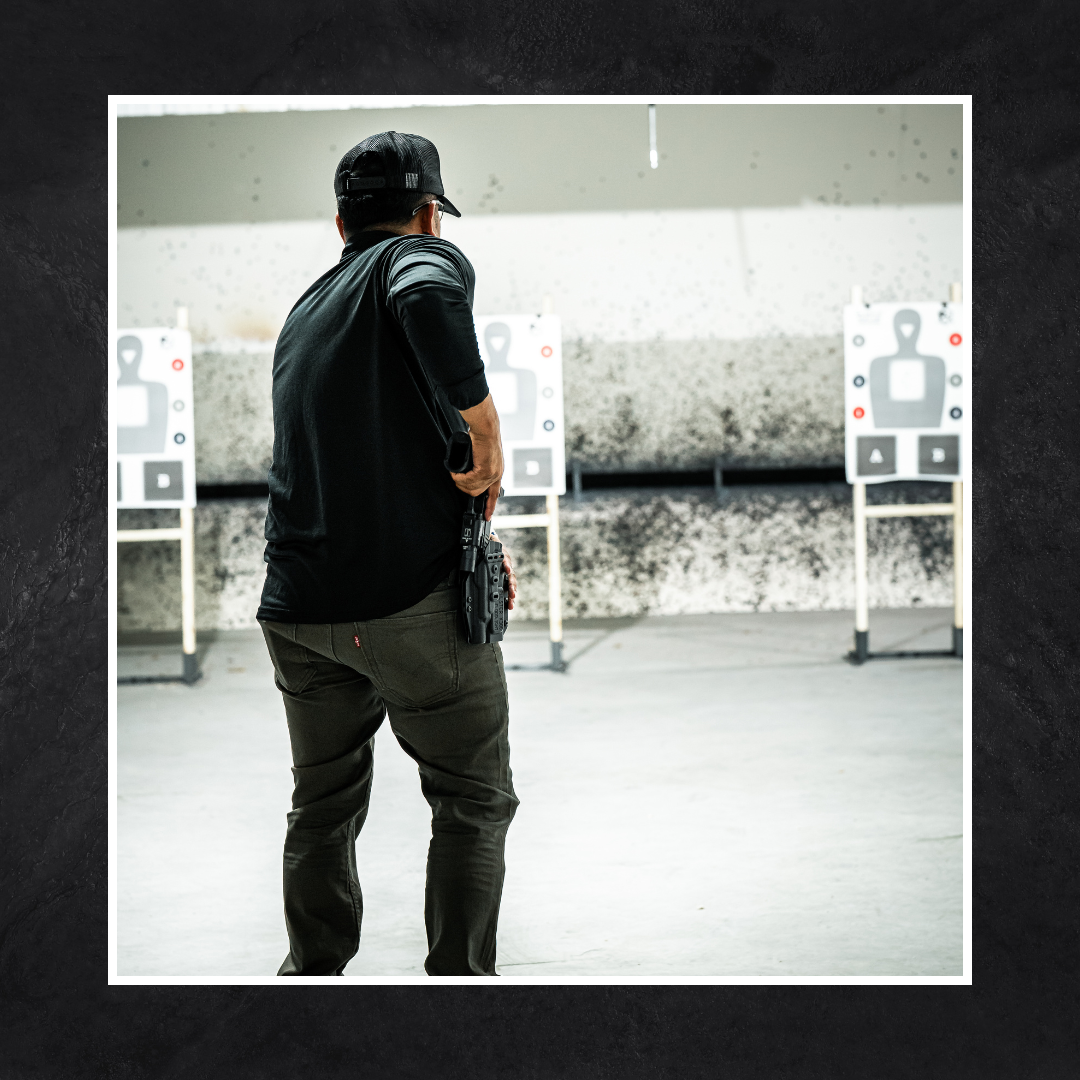 Man drawing pistol from holster