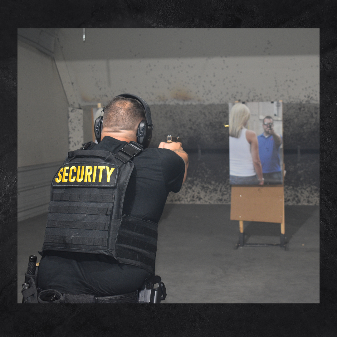 A security personnel in a tactical vest aimed at a target during firearm training in a shooting range, with a simulated scenario displayed on the target.