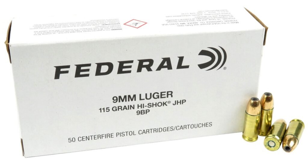 A box of Federal brand 9mm Luger ammunition, containing 50 centerfire pistol cartridges. The box displays product details and has several cartridges next to it, which are gold-colored with a bullet tip.