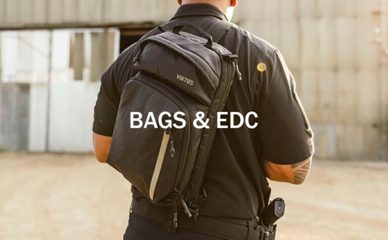A person wearing a black backpack while standing outdoors, with a focus on the bag's features. The text 'BAGS & EDC' is prominently displayed in white over the image.