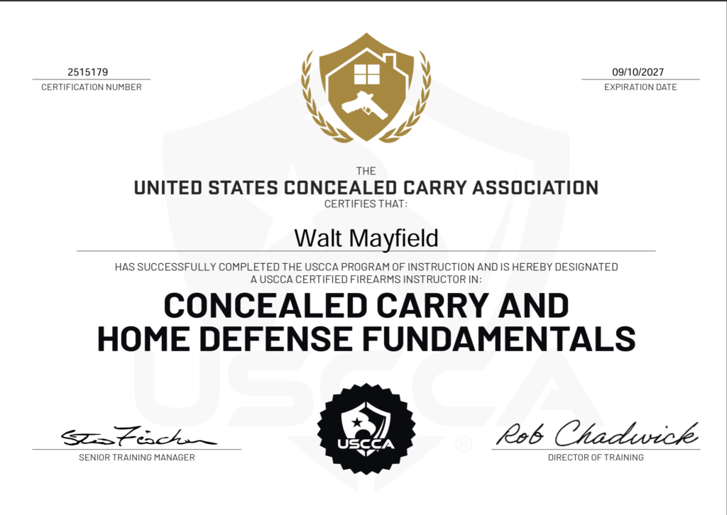 A concealed carry and home defense fundamentals certificate for Walt Mayfield from the United States Concealed Carry Association, with a gold emblem at the top and signatures at the bottom.